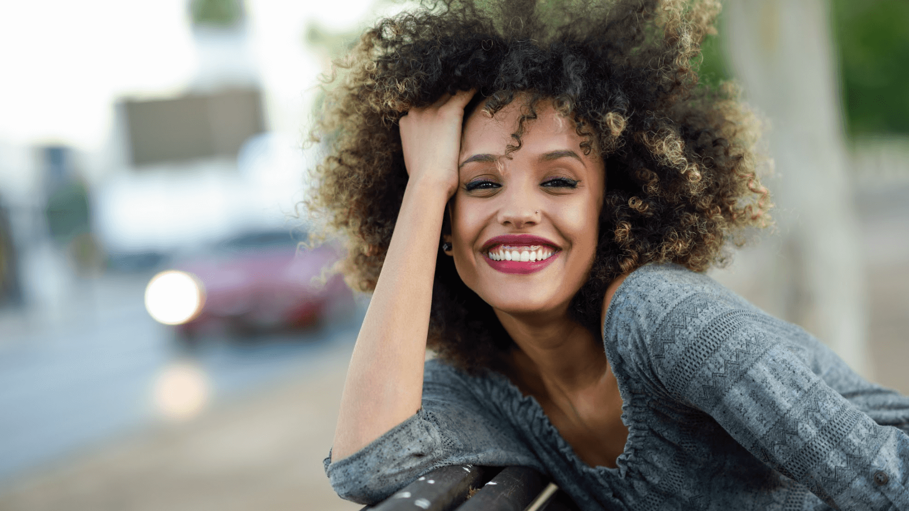 woman smiling outside